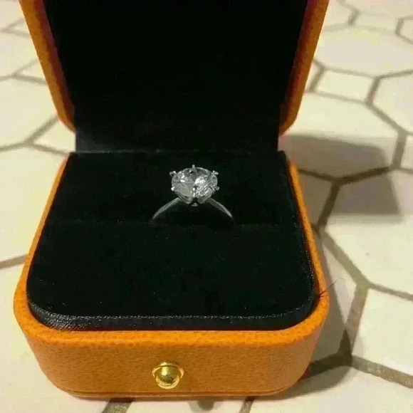 Eterna Moissanite Round Cut Solitaire Ring - Picture 1 of 11